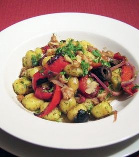 Warm gnocchi salad with walnuts