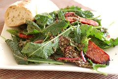 Warm green lentil, chorizo & cavolo nero salad