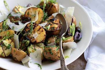 Warm grilled potato salad with olives and Parmesan