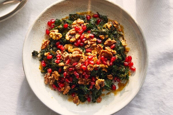 Warm kale salad with walnuts and pomegranate