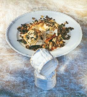 Warm lentil salad with pepper-grilled goat cheese & anchovy toasts