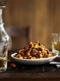 Warm mixed nuts with smoked paprika and rosemary