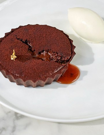Warm molten chocolate and salted caramel tarts