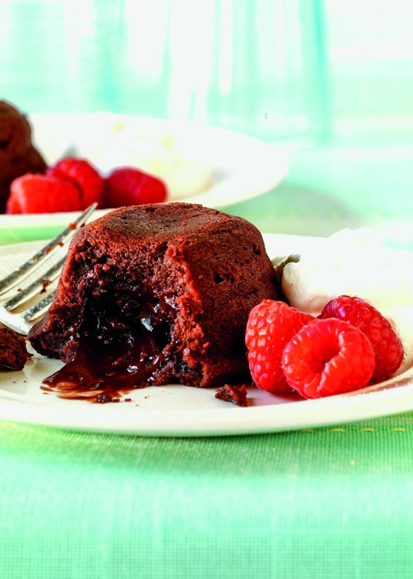 Warm molten chocolate cakes with fresh berries