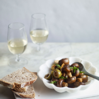 Warm mushroom and olive antipasto with oregano 