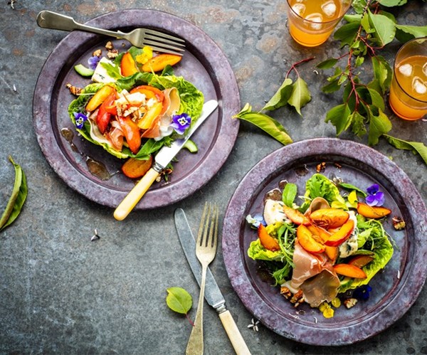 Warm nectarine salad with blue cheese, prosciutto & chilli pecans