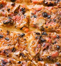 Warm olive and caramelized onion tart