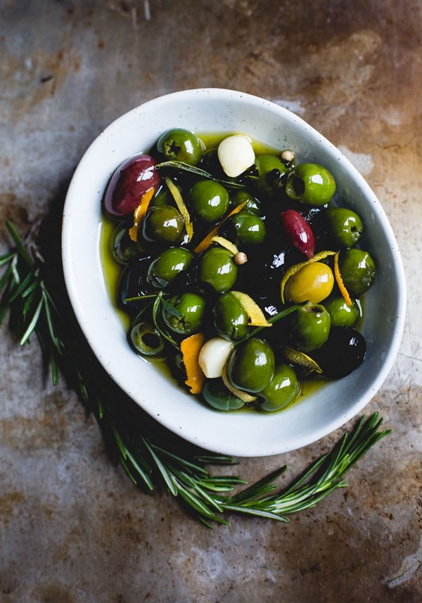 Warm olives with citrus, rosemary, and a splash of gin