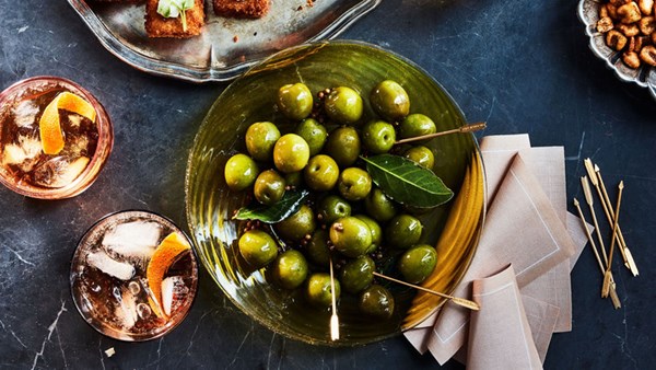 Warm olives with cracked coriander