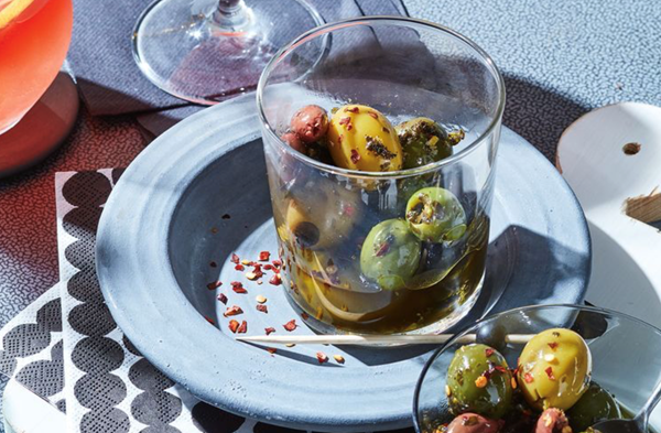 Warm olives with vermouth, slow-cooked herbs and chilli