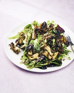 Warm oyster mushroom salad with quinoa and baby greens