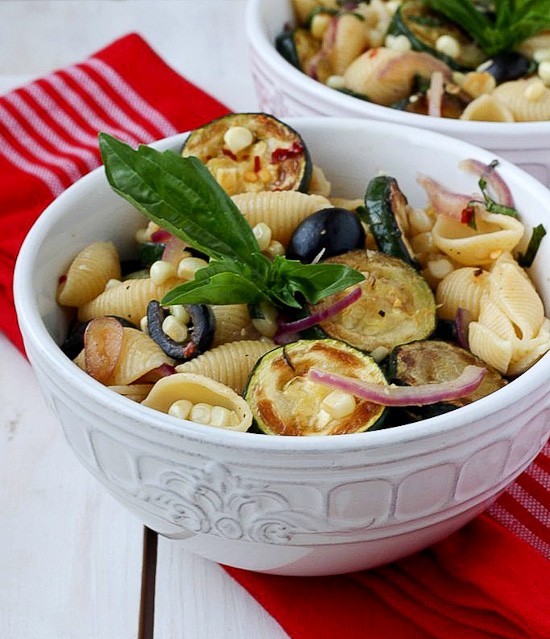 Warm pasta salad with corn and zucchini
