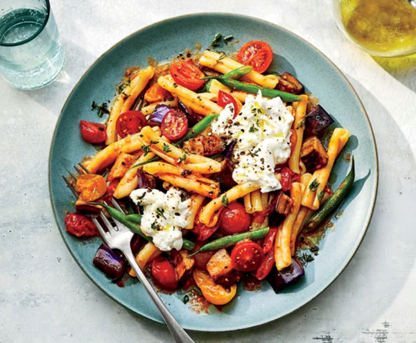 Warm pasta salad with tomatoes and eggplant 