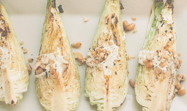 Warm pointed cabbage with lemon-garlic cashew dressing