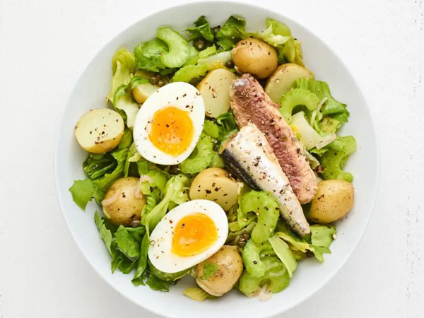 Warm potato, escarole and tinned fish salad