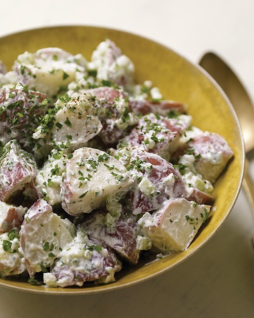 Warm potato salad with goat cheese