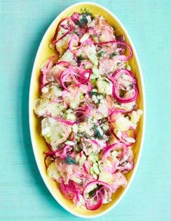 Warm potato salad with pickled red onion