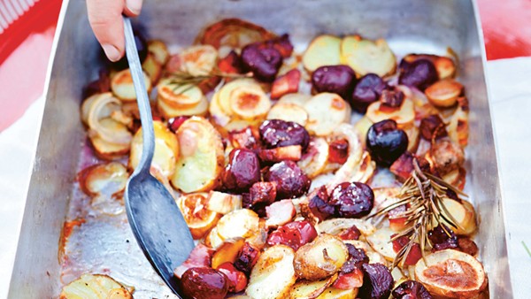 Warm potato salad with pork belly and cherries