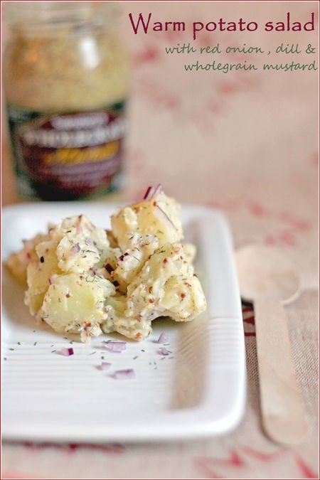 Warm potato salad with red onion, dill and wholegrain mustard