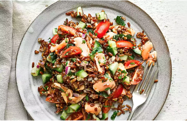 Warm red rice, herb and salmon salad