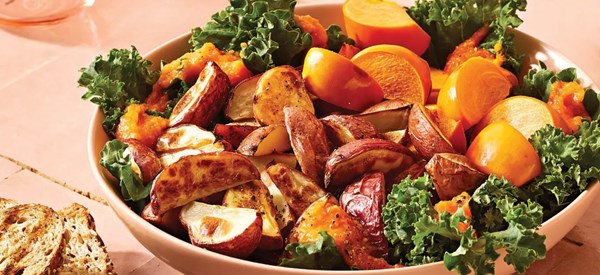Warm roasted potato and persimmon salad