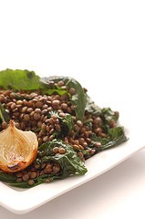 Warm salad of lentils, cavolo nero & roast baby onions