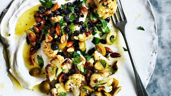 Warm salad of roast cauliflower, labna, olives and almonds