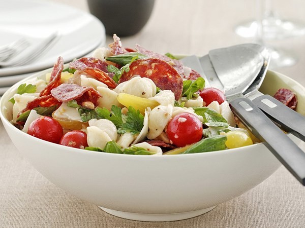 Warm salami and tomato pasta salad