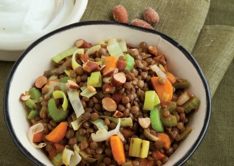Warm spiced lentil bowl with yogurt and smoked almonds