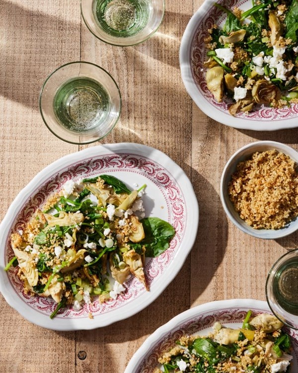 Warm spinach-artichoke salad with quinoa crunchies