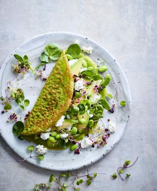 Watercress crepes with ricotta, avocado & edamame