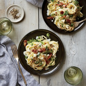 Watercress, prosciutto, and goat cheese linguine