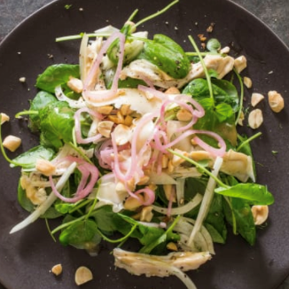 Watercress salad with chicken, fennel, and pickled shallots