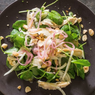 Watercress salad with chicken, fennel, and pickled shallots