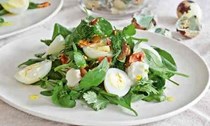 Watercress salad with quail's eggs, ricotta and seeds
