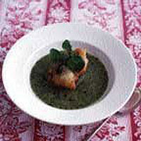 Watercress soup with a mushroom and spinach beignet