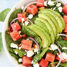 Watermelon avocado spinach salad with poppy seed dressing