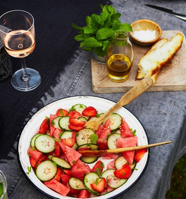Watermelon, cucumber and strawberry salad with a gin splash