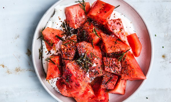 Watermelon with yogurt, poppy seeds, and fried rosemary