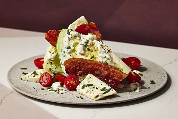 Wedge salad with candied bacon and Gorgonzola dressing