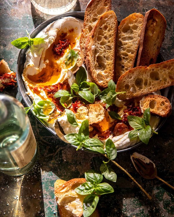 Whipped goat cheese and Calabrian chile oil dip