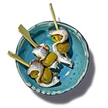 White anchovy, pickled pepper, and manzanilla olive (Gildas)