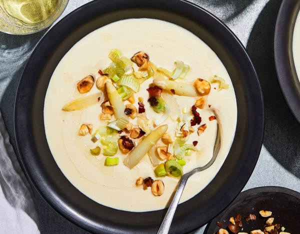 White asparagus soup with pickled ramps and hazelnuts