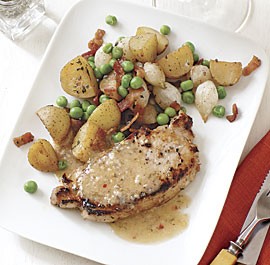 White balsamic pork chops with roasted potatoes and peas