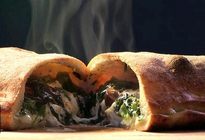 White bean and caramelized onion calzone