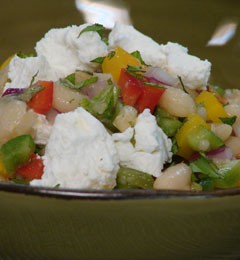 White bean salad with peppers, goat cheese, and mint