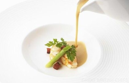White bean velouté with chorizo and langoustine