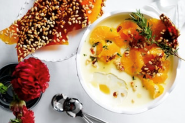 White chocolate and rosemary panna cotta with pine nut praline and orange