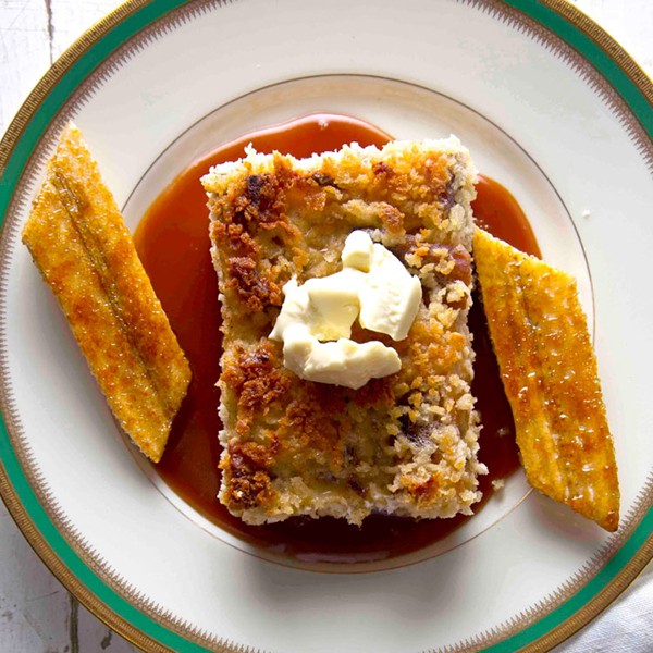 White chocolate bread pudding with bananas and rum sauce