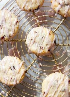 White chocolate cranberry cookies with sumac glaze
